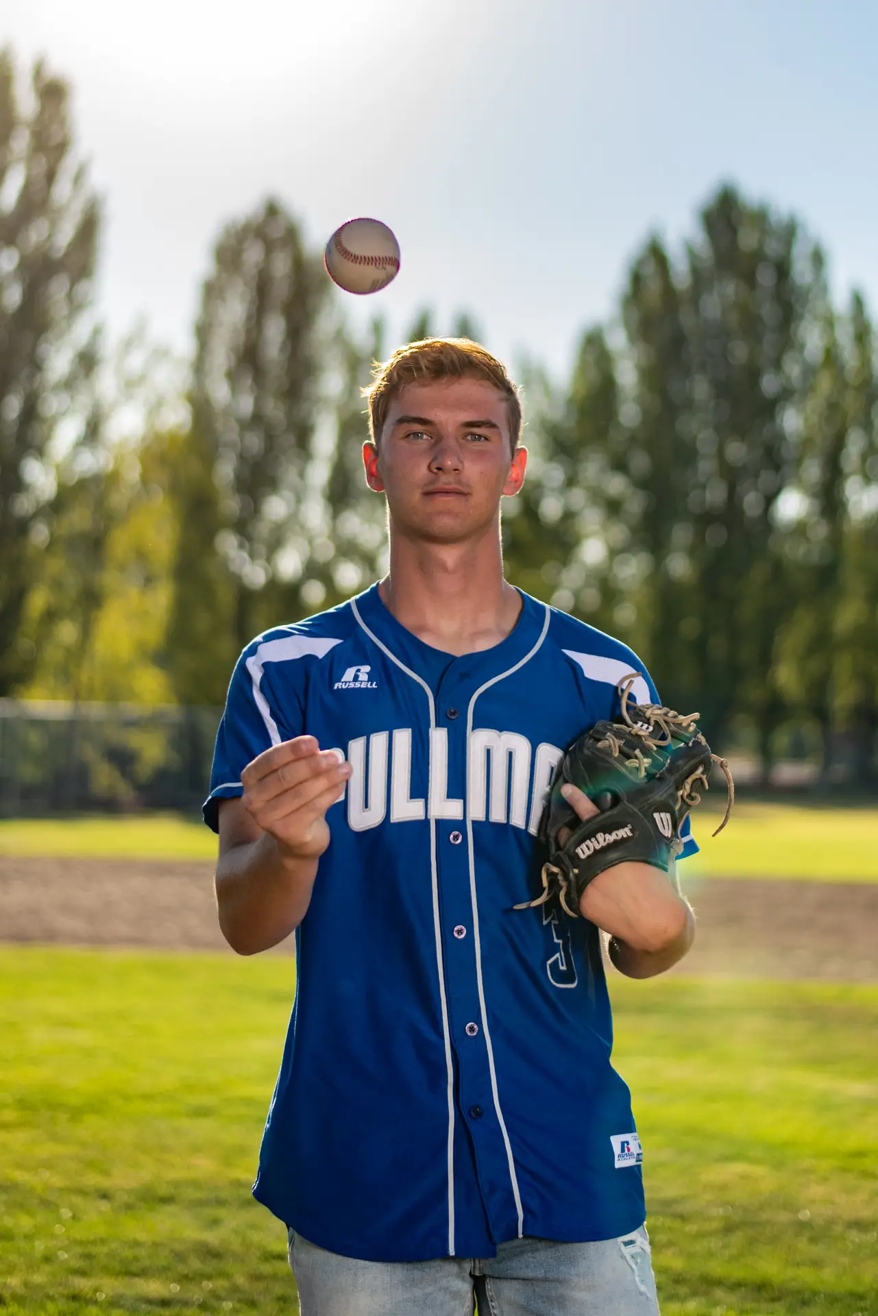 Graduating student athlete action shot in Pullman, WA — photo 8